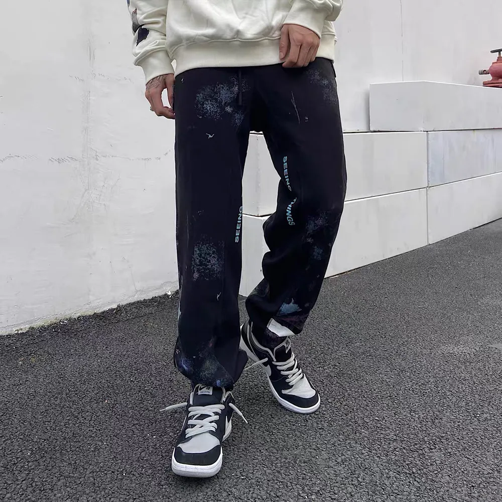 ♻️💯Refer to the model picture for the upper body❤️Examined version OFF 17FW WHITE Starry Sky Fireworks Splash Ink OW Sports Autumn and Winter Sweatpants Casual Pants for Men and Women. The firework color is obtained through contrasting printing. There are eight panels in the whole body. Seven color sets and eight panels are divided into eight printings. The first layer is gray, the second layer is white, the third layer is yellow, the fourth layer is green, the fifth layer is blue, the sixth layer is purple, the seventh layer is orange, and the last layer is arrow paint printing. The seven colors are layered on top of each other, and new colors will appear. The arrows on the back and the squares on the front are first glued and then hung four times in a row. The paint has a distinct concave and convex feeling. Quality depends on the details. The blue letters are electrostatic three-dimensional flocking. They are done separately first and then printed through high-temperature thermal transfer. The difficulty is unprecedentedly high. The total number of fireworks series produced exceeds 50,000 pieces, and more than half of the ones seen on the market are from my home!  Size: XS-L Color: Black (The waist is elastic and can be enlarged) P: 380